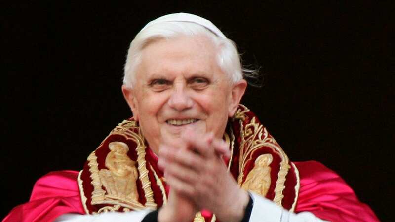Catholics across the world pray for Pope Benedict XVI as his body lies in state