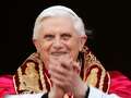Catholics across the world pray for Pope Benedict XVI as his body lies in state