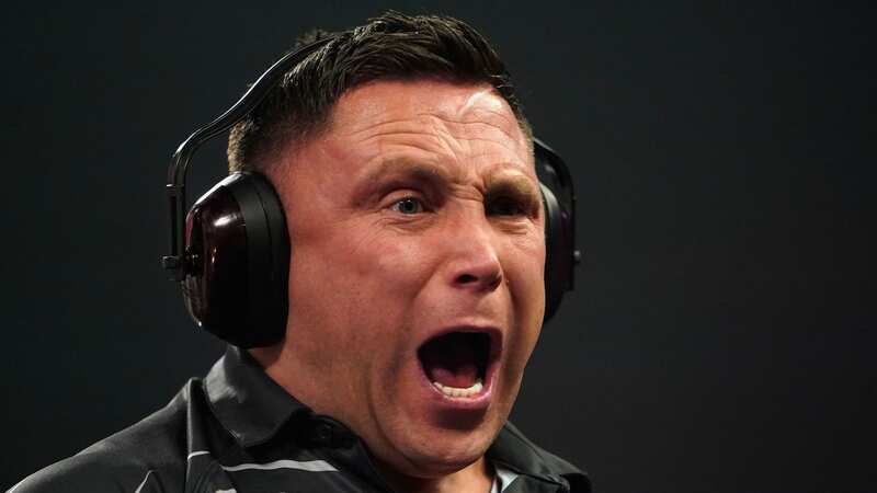 Gerwyn Price was left red-faced after suffering a shock quarter-final defeat while wearing ear defenders (Image: Getty Images)