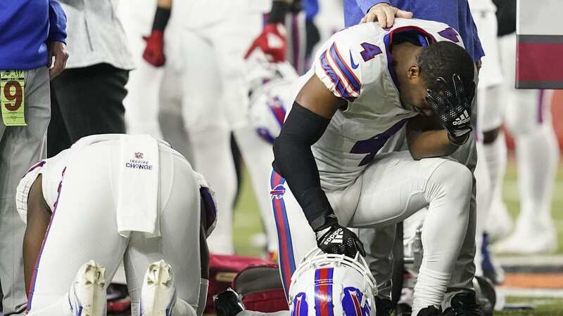 Buffalo Bills and Cincinnati Bengals players broke down after Damar Hamlin suffered a cardiac arrest on the field (Image: Photo by Kevin Sabitus/Getty Images)