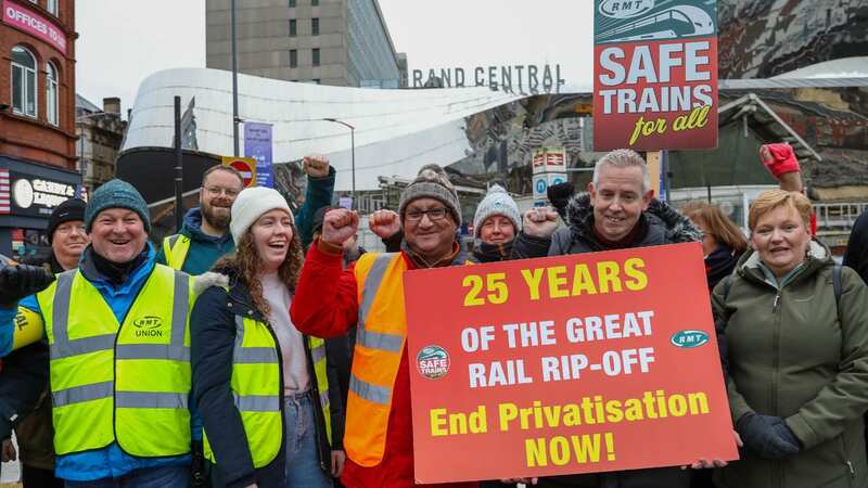 A picket line outside Birmingham New Street station (Image: SWNS)