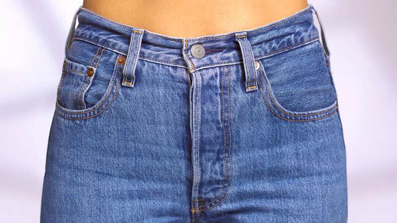 Woman shares how to add adjustable waistband to jeans with no sewing required
