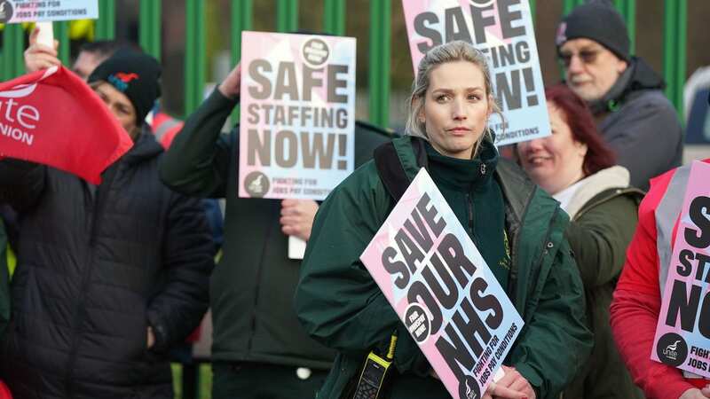 Ambulance workers on the picket line outside ambulance headquarters in Coventry (Image: PA)