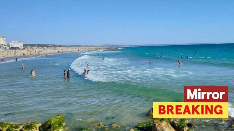 The 19-year-old and two pals got into difficulties during a dip off a small sandy beach on the Costa da Caparica coastline south of Lisbon. (Image: SOLARPIX.COM)
