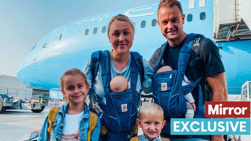 Mum Karen and dad Shaun travelling with their kids Fionn, Fern, Esme and Quinn (Image: @TRAVELMADMUM / CATERS NEWS)