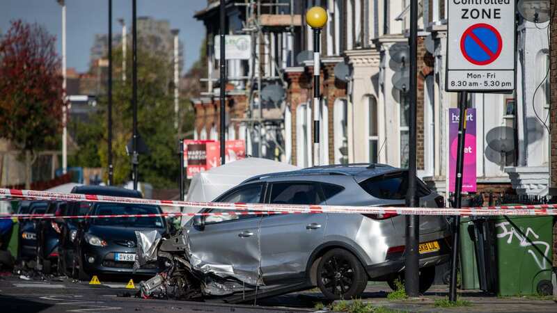 Debris from vehicles is seen on Railton Road, Brixton at the scene of the shooting (Image: Getty Images)