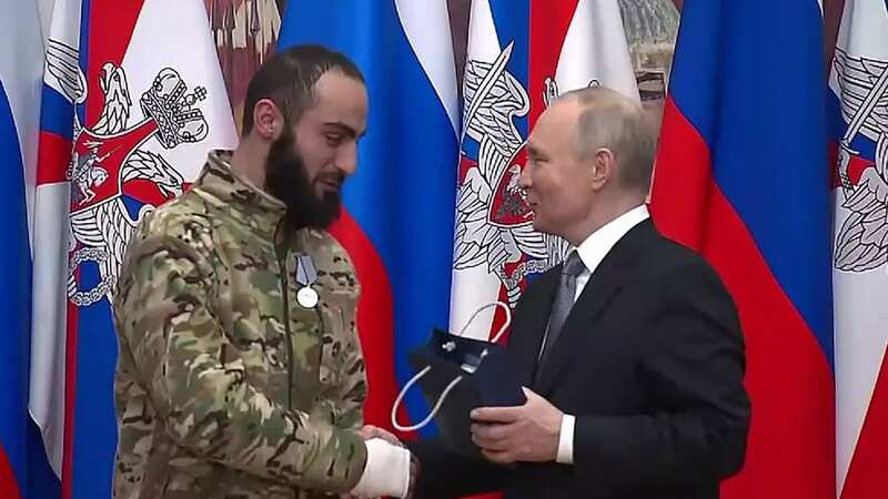Vladimir Putin awards armed robber with 
