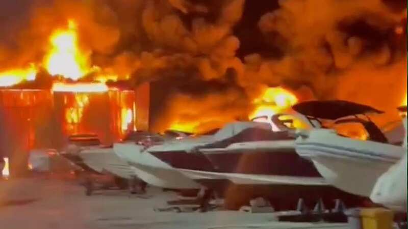 Massive blaze rips through marina and destroys 80 boats in Brit holiday resort