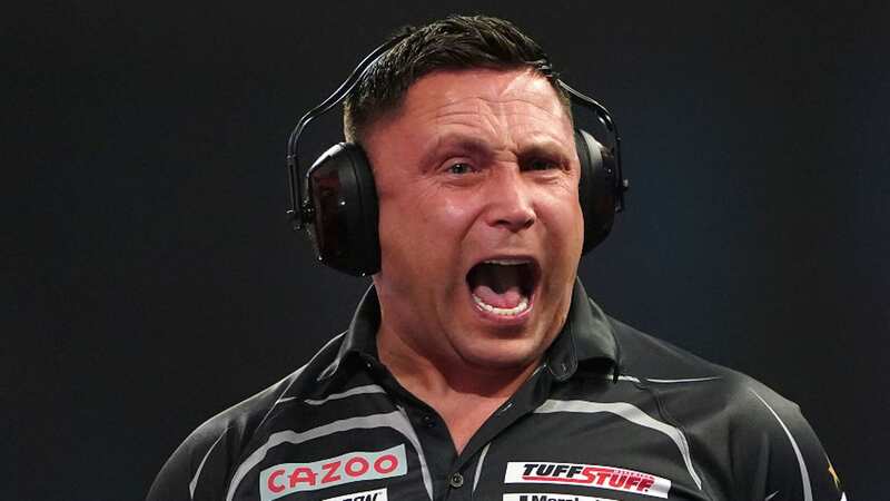 Gerwyn Price wearing ear defenders during his match against Gabriel Clemens (Image: PA)