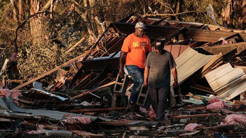 A major search and rescue operation is ongoing after tornadoes flattened houses and ripped trees from their roots (Image: DAN ANDERSON/EPA-EFE/REX/Shutterstock)