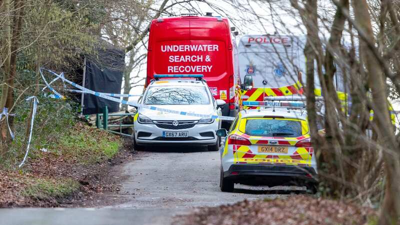 Police at the scene of where a woman was killed by a dog at a beauty spot near Caterham, Surrey (Image: Steve Reigate)