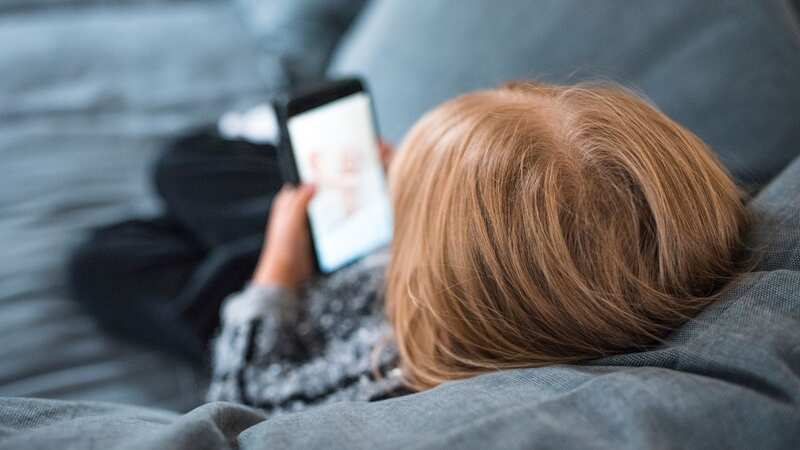 A mum is warning other parents after discovering her daughter had been groomed to upload inappropriate pictures of herself to the music streaming platform (Image: Getty Images)