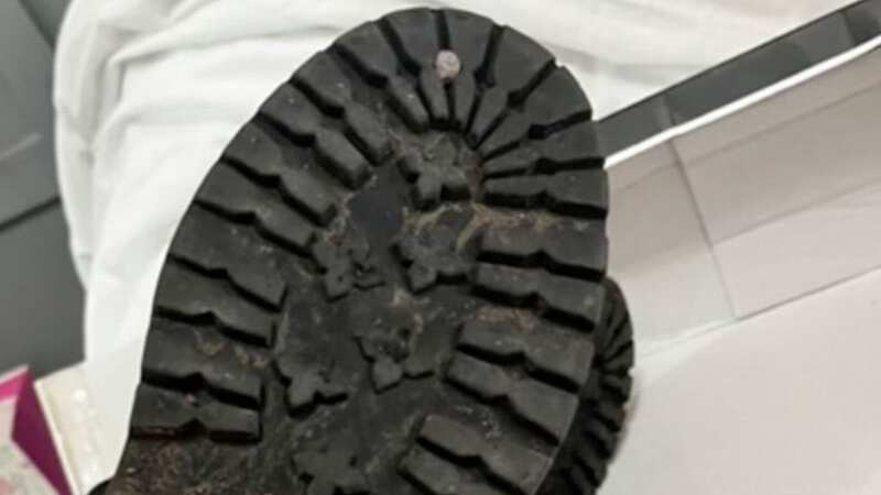 The boots arrived covered in mud (Image: Emily Carragher / CATERS NEWS)