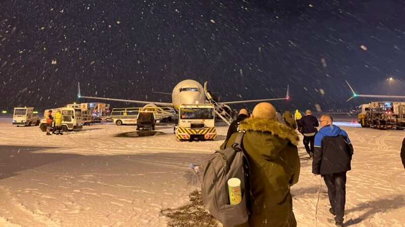 Snow closes UK airport on coldest day of the year as Met Office issues warnings