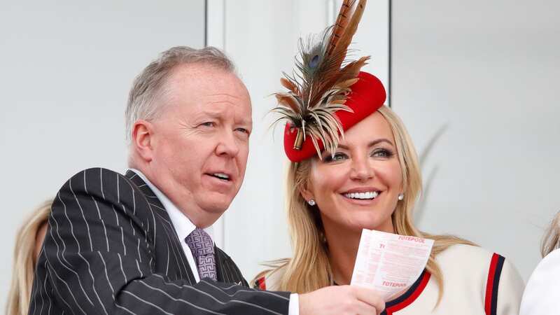Doug Barrowman and Baroness Michelle Mone watch the racing (Image: Getty Images)