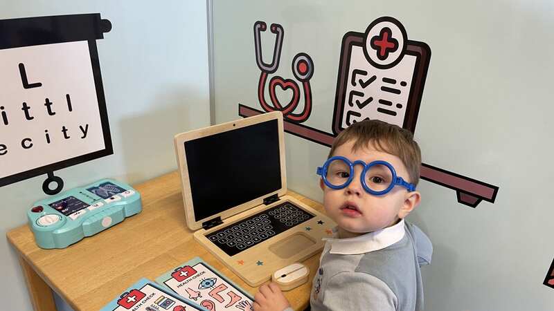 A toddler who taught himself to read aged just two years old has become one of the youngest people in the world to join Mensa (Image: Beth Hobbs / SWNS)