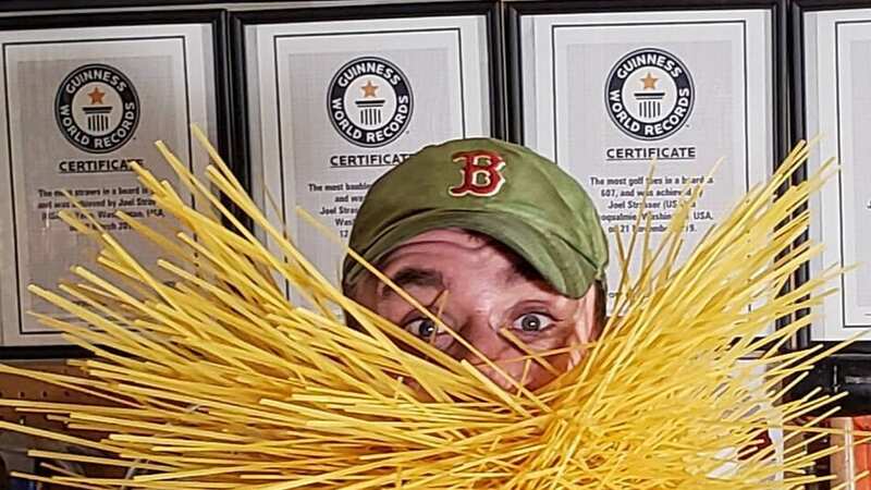 Joel Strasser holds nine world records for putting bizarre items into his beard (Image: joelnert/Instagram)