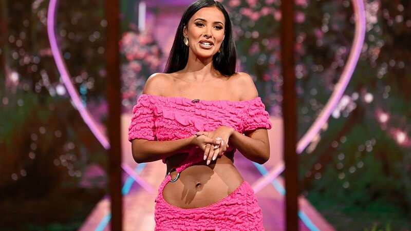 Maya Jama shows off her abs in bright pink dress in Aftersun debut