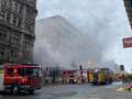 Huge blaze at iconic city building as smoke fills street and crews rush to scene eiqrdiqukidqdinv