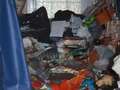 Inside hoarder's home piled so high with tat he couldn't use heating or bathroom