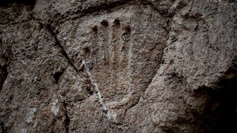 A handprint can be seen in the moat wall (Image: Yoli Schwartz/HANDOUT/EPA-EFE/REX/Shutterstock)