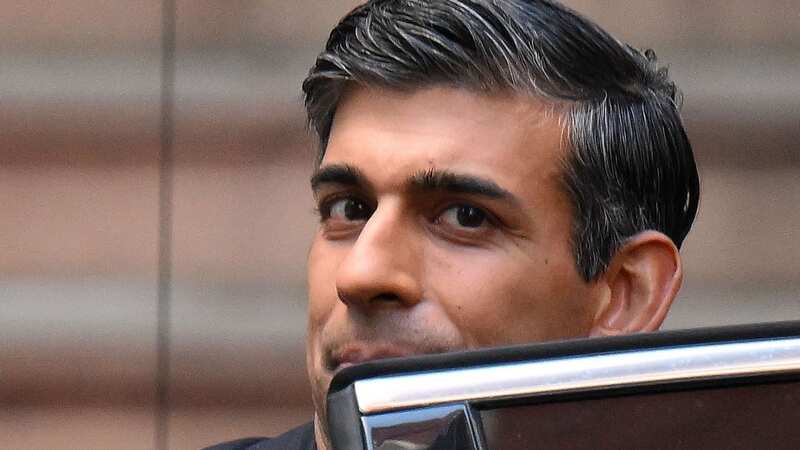 Under-fire Rishi Sunak is whisking his cabinet away from London today (Image: AFP via Getty Images)