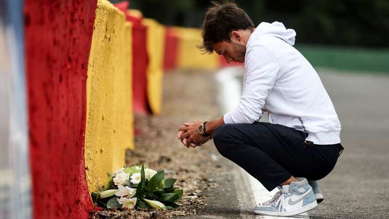 Pierre Gasly lays flowers on the Spa-Francorchamps track at the site of the crash which killed Anthoine Hubert in 2019 (Image: Getty Images)