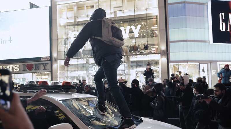 Protester smashes up police car as Tyre Nichols police death video sparks unrest