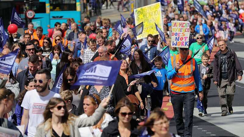 Striking teachers from the National Union of Teachers (NUT) take part in a rally and march through Liverpool (Image: Getty Images)