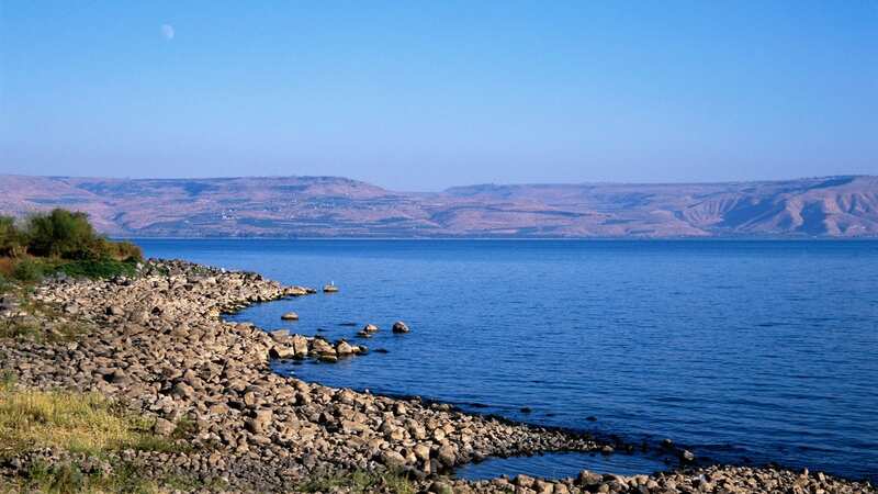 The Sea of Galilee in Israel is also known as Lake Tiberias, Lake Gennesaret, and Yam Kinneret (Image: Getty Images)