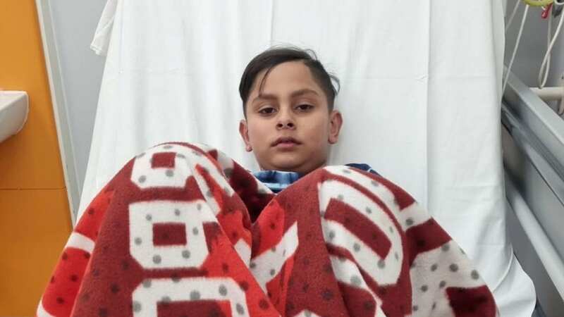 Mohammad Izaan Danish in hospital (Image: Sajida Jabeen / SWNS)