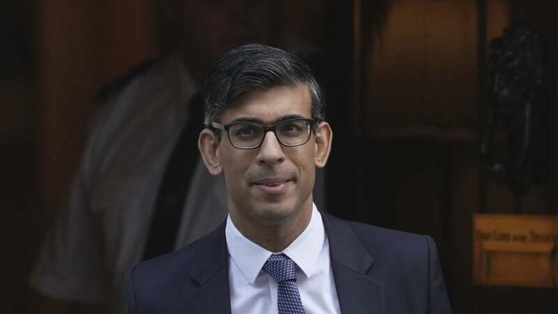 Rishi Sunak leaves No10 for a grilling at PMQs (Image: Kin Cheung/AP/REX/Shutterstock)
