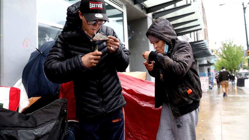 People smoking drugs in Vancouver (Image: Los Angeles Times via Getty Images)