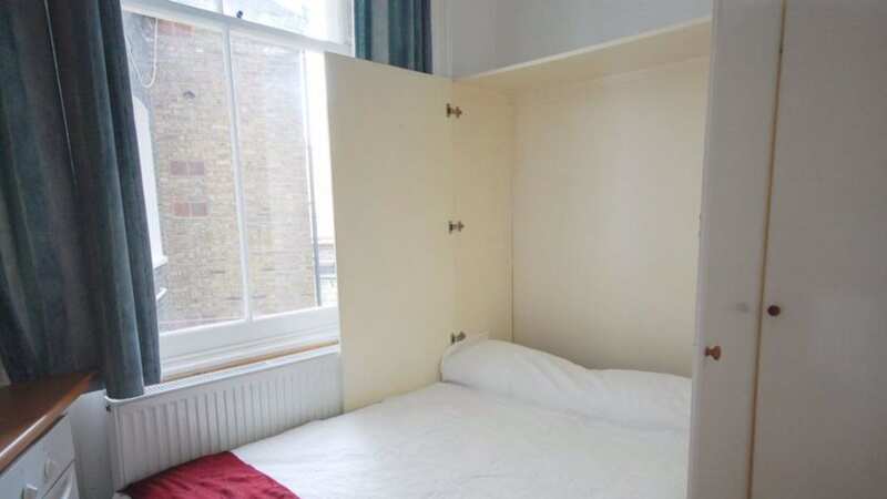 London flat for rent for £1,400 a month with bed tucked away in kitchen cupboard