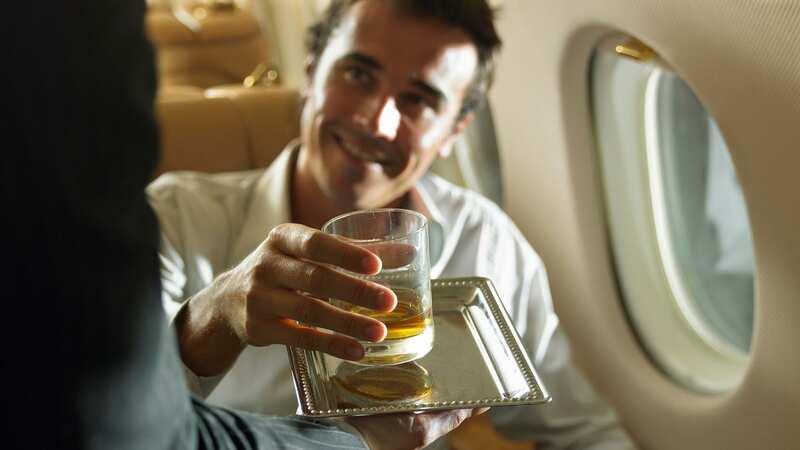 A man and his pal flew luxury in first-class while his wife was alone in economy (stock photo) (Image: Getty Images)