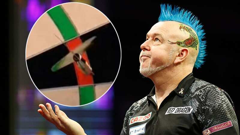 Peter Wright has been proved innocent despite suggestions he cheated in the Premier League Darts (Image: PDC/Twitter)