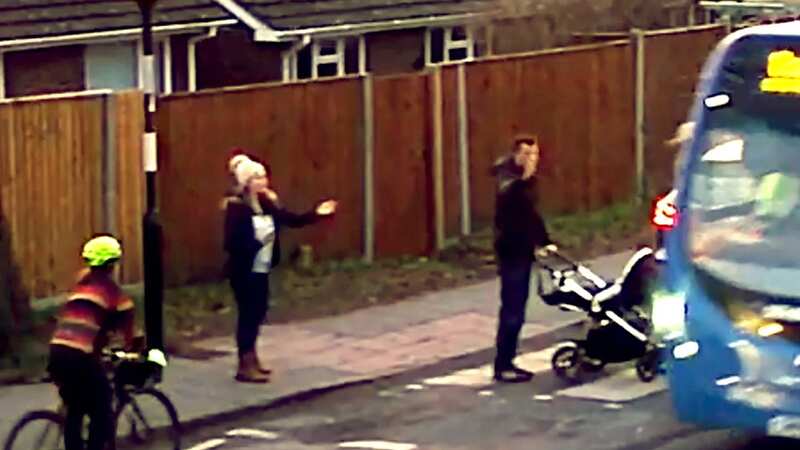 Horrifying moment dad and baby in pram narrowly avoid being run down by bus