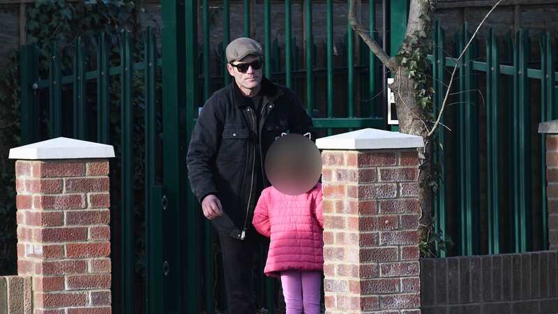 David Jones and his six-year-old daughter at the hostel where Gary Glitter is being held (Image: Reach Commissioned)
