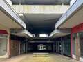 Inside eerie shopping centre with overgrown weeds ahead of demolition
