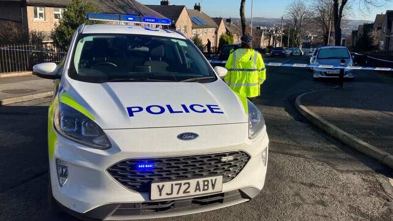 Walpole Road in Huddersfield has been cordoned off by officers this morning (Image: Robert Sutcliffe/Yorkshire Live)