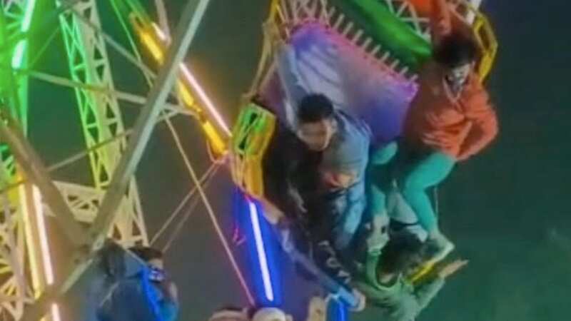 Ferris wheel breaks down and leaves riders hanging from their seats upside down