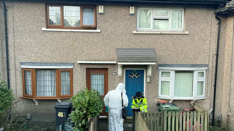 Police and forensic teams at the home in Huddersfield (Image: Ashley Pemberton / SWNS)