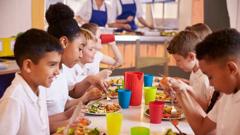 Children were left "in tears" as lunch staff reportedly took food away over debts. (Image: Getty Images/iStockphoto)