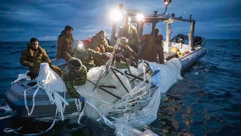 Authorities are collecting pieces of the downed balloon to analyse them (Image: US NAVY/AFP via Getty Images)