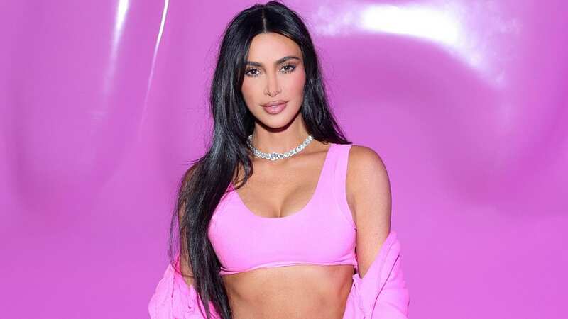 Kim Kardashian shows off tiny waist in Barbie pink outfit for SKIMS launch