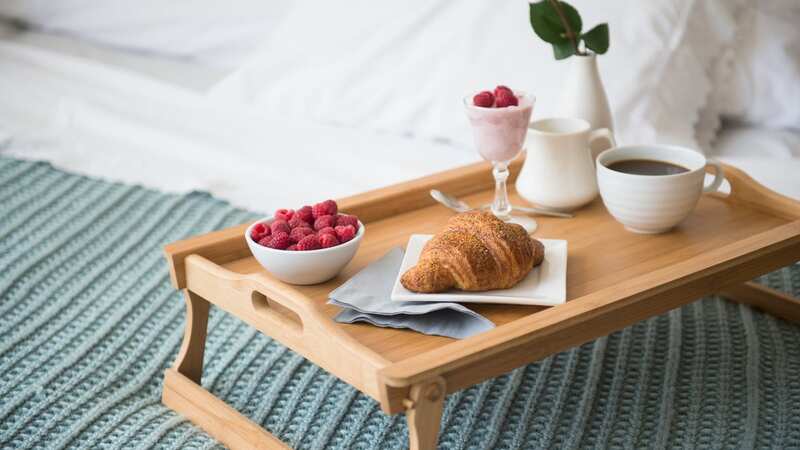 Three in five think breakfast is the most acceptable meal to enjoy in bed (Image: Jamie Grill/Tetra Images/Getty Images)