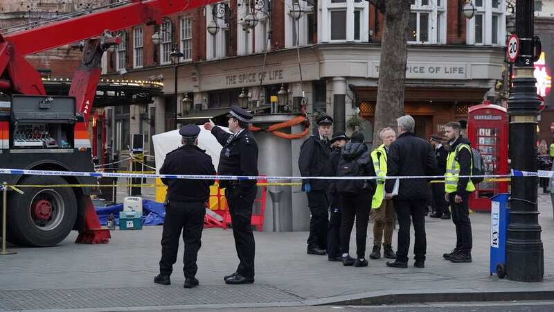 A police tent is erected at Cambridge Circus during the incident (Image: PA)