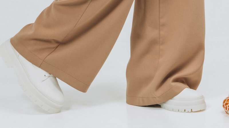 Long trousers often end up dragging on the floor (stock photo) (Image: Getty Images)