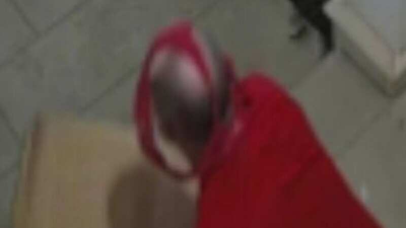 He was caught wearing red knickers as a mask (Image: Tulsa Police Department)