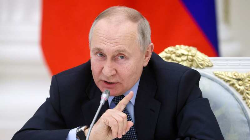 Vladimir Putin gestures during a meeting with representatives this week (Image: Mikhail Metzel/AP/REX/Shutterstock)